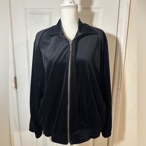 Velour style feeling material (100% Polyester) zip up jacket.
